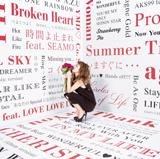 AZU、約100曲のタイトルに包まれた10周年記念ベストジャケット写真公開！